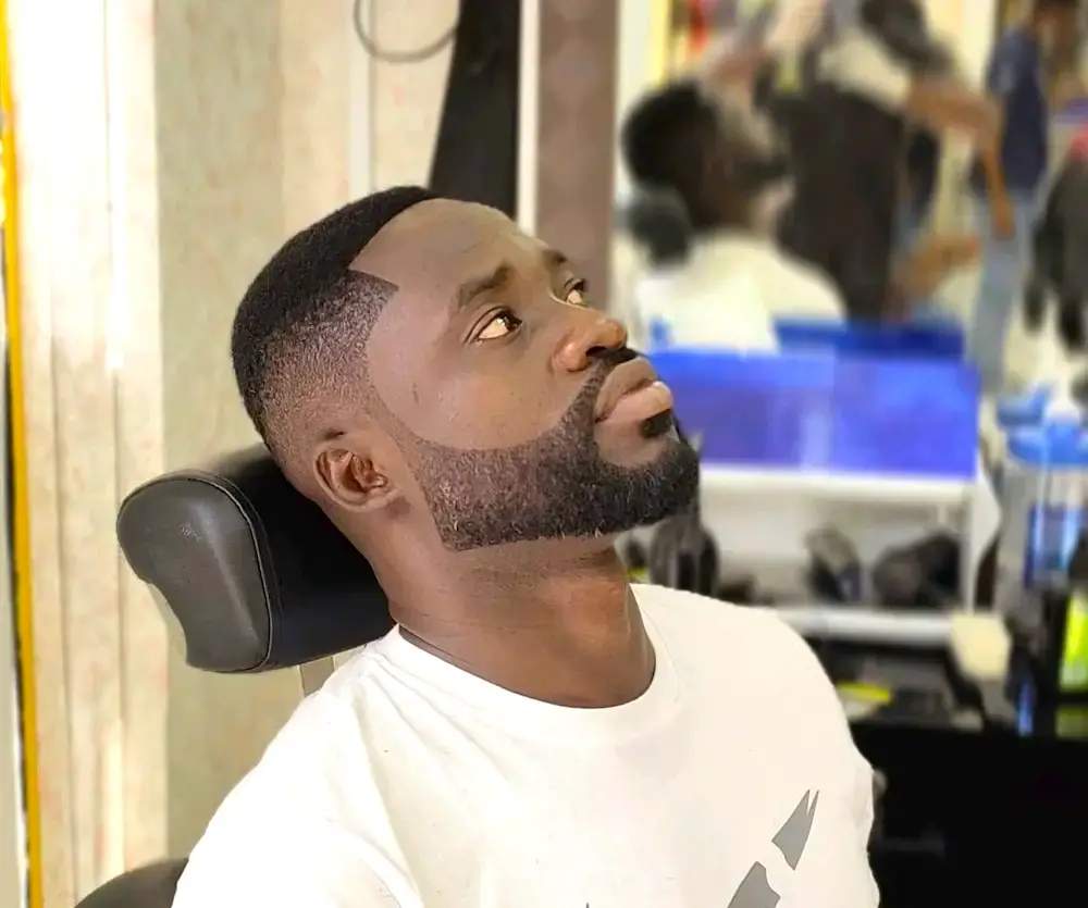 clean fade haircut with beard styling at Kings Afro Barbershop in JVC Dubai