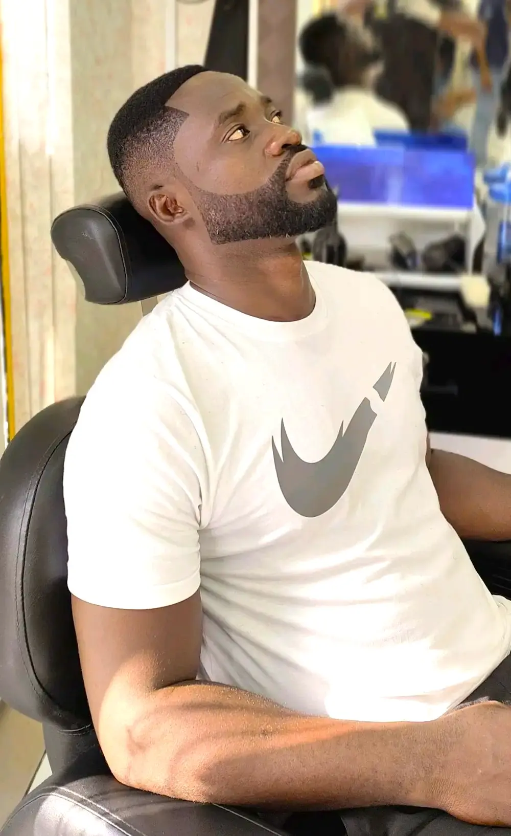 clean fade haircut with beard styling at Kings Afro Barbershop in JVC Dubai