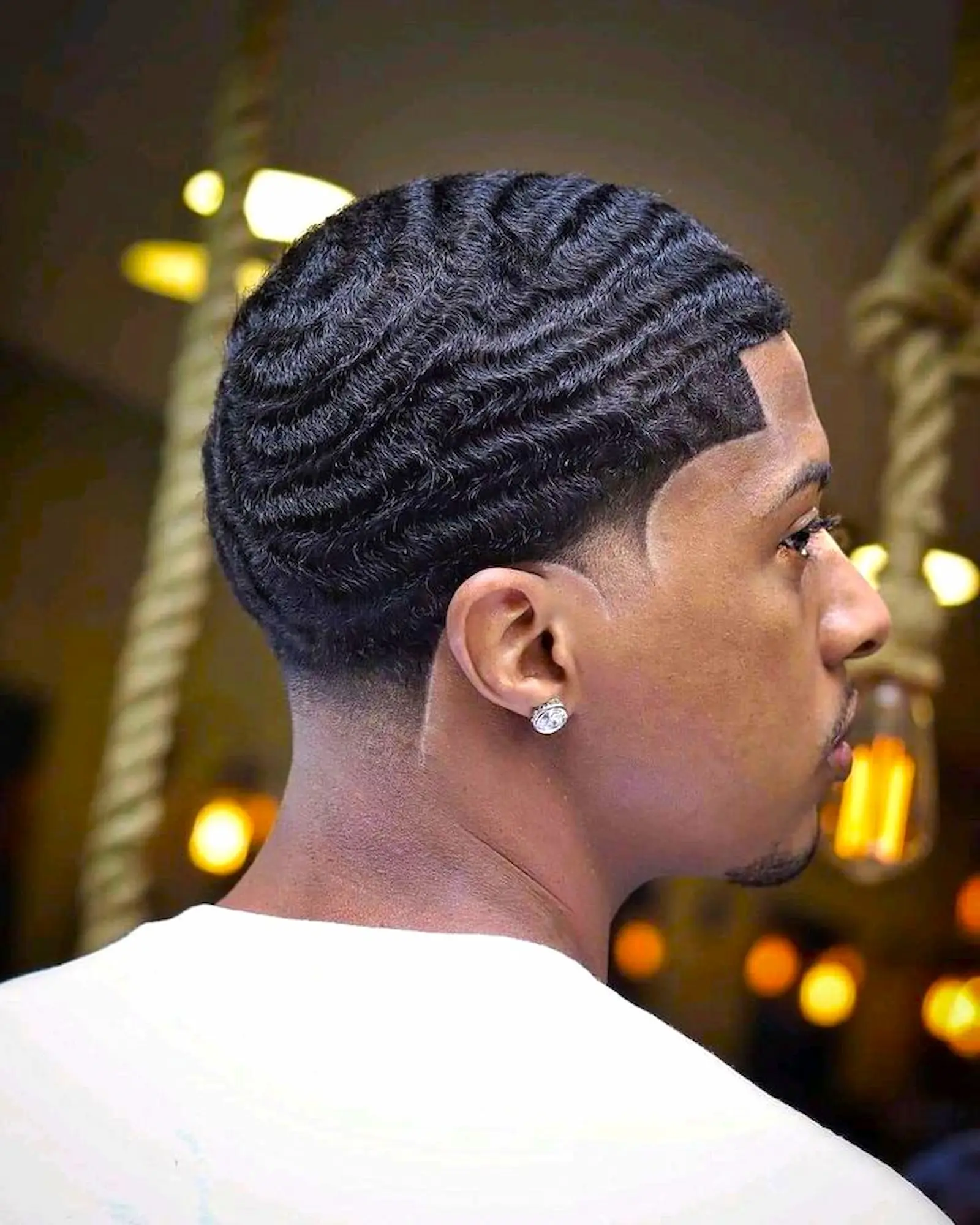 sharp wave haircut with clean fade and precise lineup at Kings Afro Barbershop in JVC Dubai