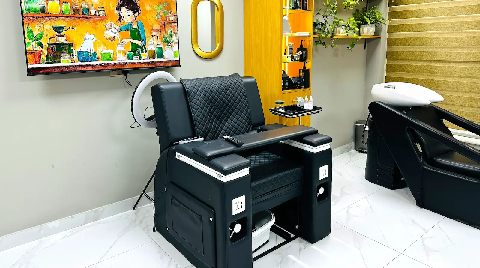 modern barbershop massage chair for clients with padded armrests and footrest, placed in a stylish salon interior